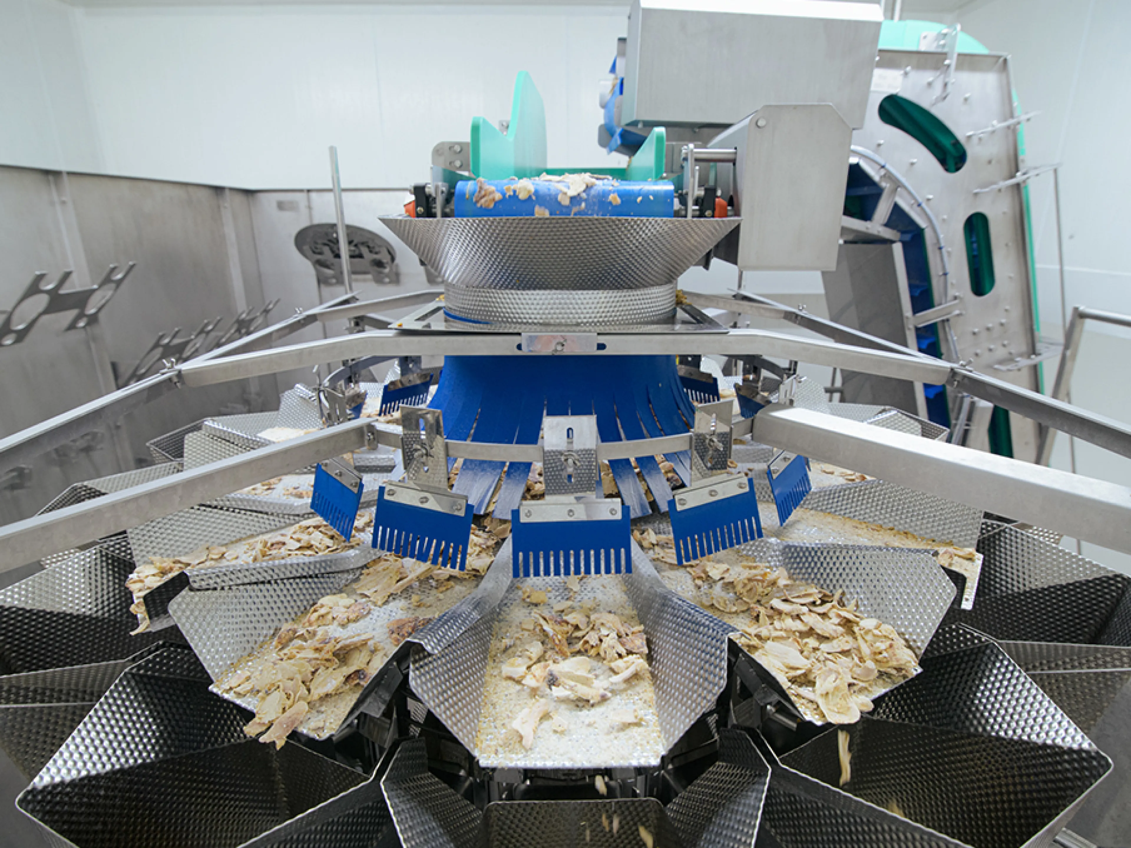 Die Wägetechnik, eine Mehrkopfwaage und eine Kontrollwaage, kommt in der neuen Verpackungslinie von Ishida, Bild: Ishida Die Wägetechnik, eine Mehrkopfwaage und eine Kontrollwaage, kommt in der neuen Verpackungslinie von Ishida